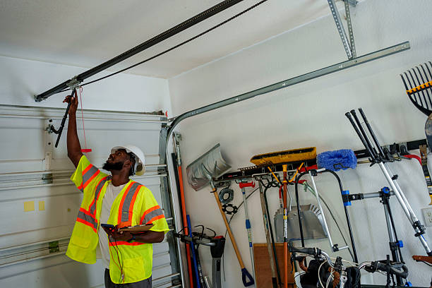 Professional Garage Door Panel Replacement technician working in Akwesasne, NY